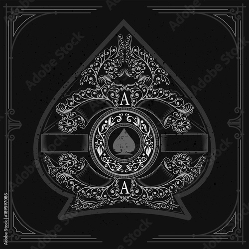 Floral pattern aroud circle shield with spades in the center inside ace of spades form. Vintage design playing card element white on black.