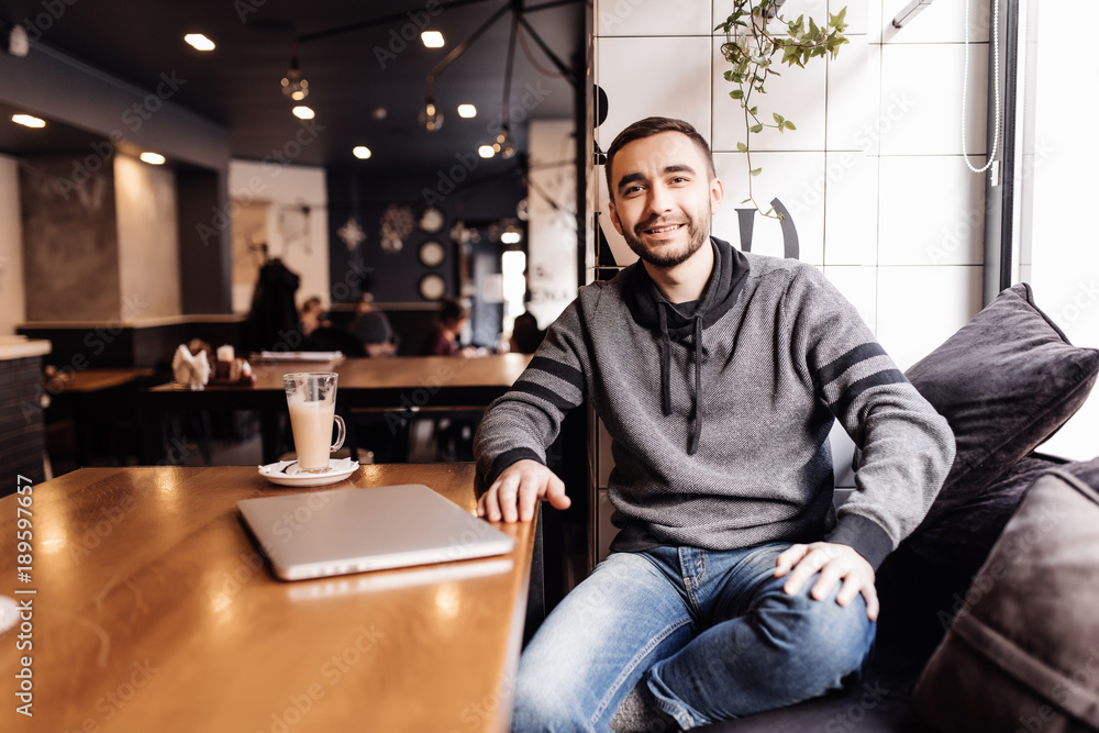 Businessman having coffee and before his work in cafe. Businessman having coffee and before his work in cafe.