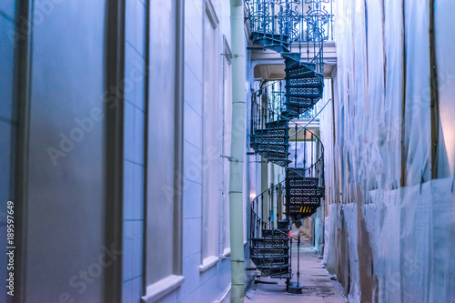 Spiral staircase between bu...