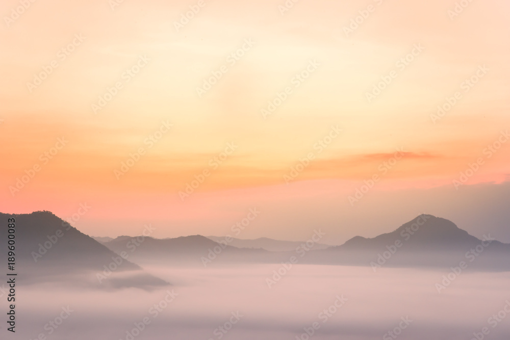  Mountainous landscape with golden sky and beautiful mist,Phu Tho Chiang Khan,Loei.