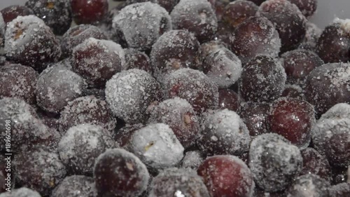 Frozen cherries. Cherry from the freezer in a plate photo