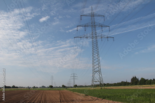 Transmission line on background of blue sky