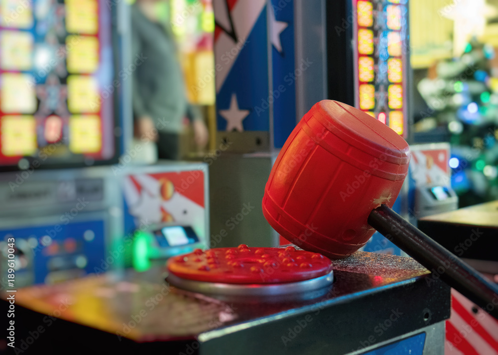 Test your strength hammer game in theme park. Stock-Foto | Adobe Stock