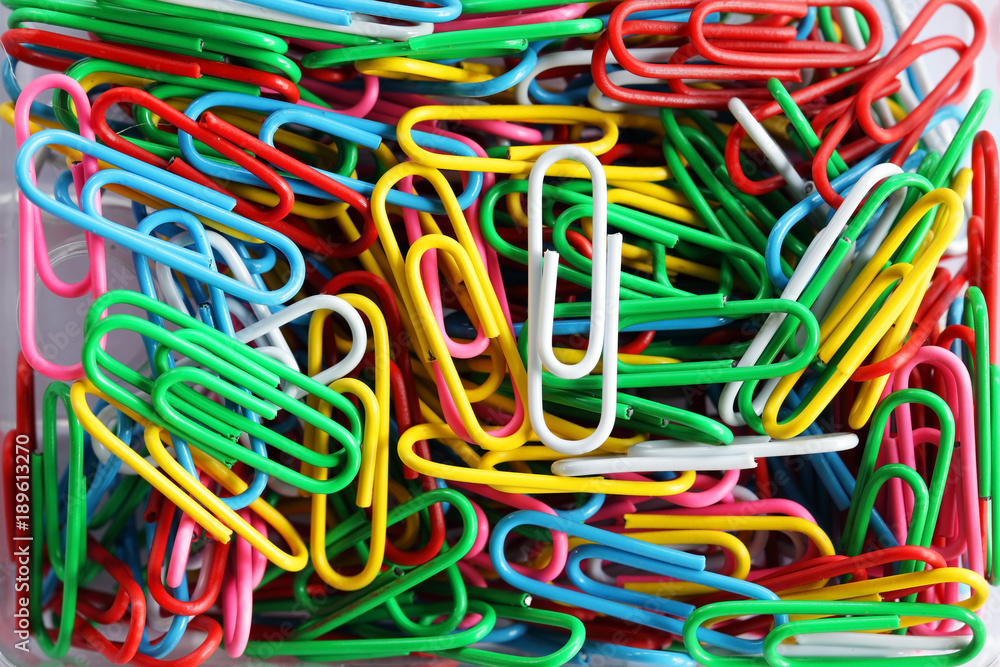 close up of colorful paper clips background close up of colorful paper clips background