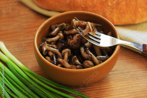 marinated mushrooms in a cup