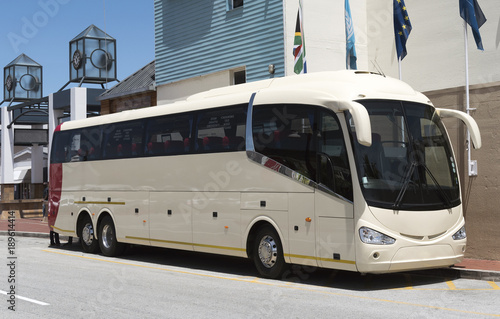 Luxury tour bus with large wing mirrors
