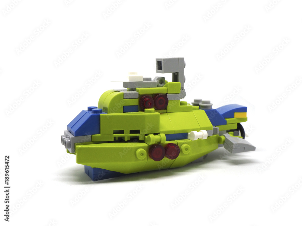 Fototapeta premium Green submarine diecast with white background