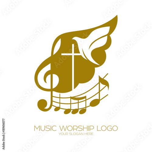 Music logo. Christian symbols. The cross of Jesus, the treble clef and the flying dove flying photo