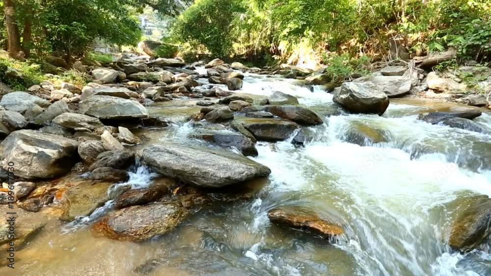 flowing water , Maeya water fall in chiangmai Thailand flowing water , Maeya water fall in chiangmai Thailand