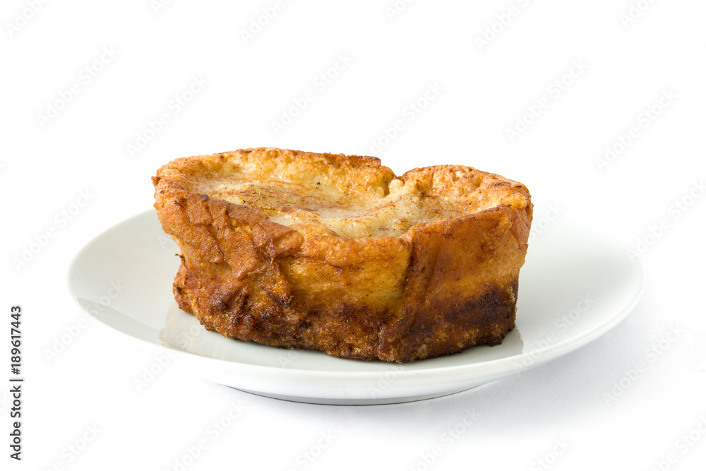 Traditional homemade Spanish torrijas isolated on white background. Easter dessert. Traditional homemade Spanish torrijas isolated on white background. Easter dessert.