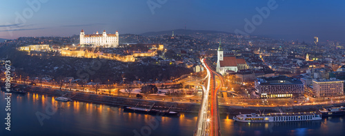 Bratislava - Panoramic skyline of the City from SNP Bridge at dusk.