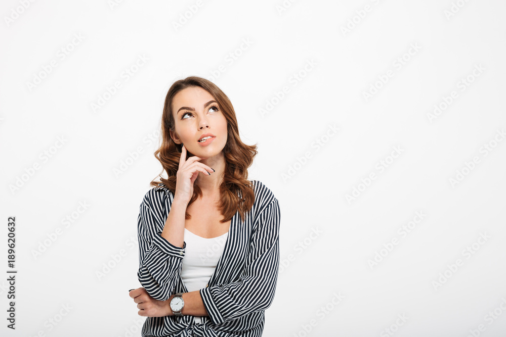 Portrait of a pensive casual girl looking away Portrait of a pensive casual girl looking away