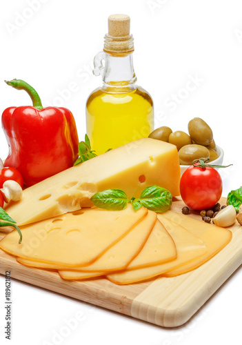 swiss cheese or cheddar and vegetables on white background