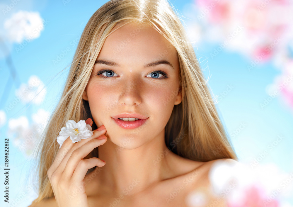 Beautiful girl with spring flowers. Beauty & Skin care. Spring. - obrazy, fototapety, plakaty 