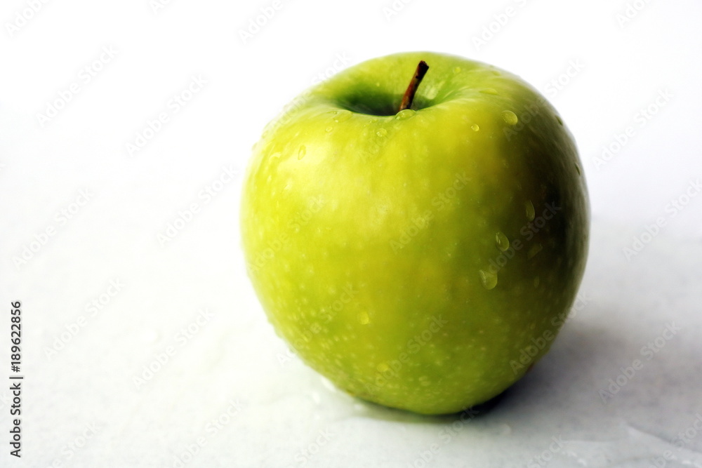 Green apple. Useful fruit. Source of iron. Fruits for a diet. Vegetarian food. Diet. Vitamins. Green apple. Useful fruit. Source of iron. Fruits for a diet. Vegetarian food. Diet. Vitamins.