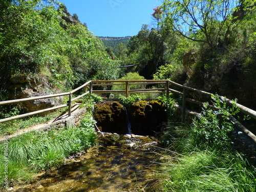 Cascada de Bogarra al sureste de la península ibérica, en la provincia de Albacete, dentro de la comunidad autónoma de Castilla-La Mancha (España), en la  la Sierra de Alcaraz photo