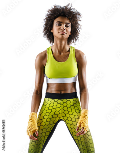 Resting time. Young boxer girl isolated on white background. Strength and motivation