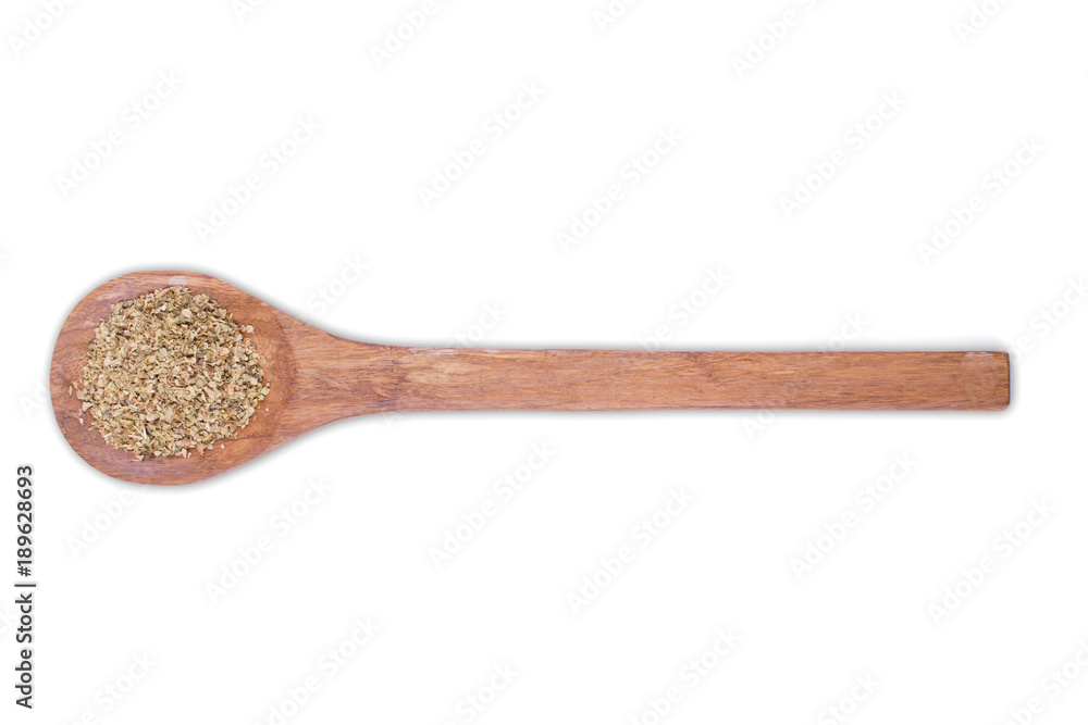 Oregano powder on wooden spoon isolated on white background Oregano powder on wooden spoon isolated on white background