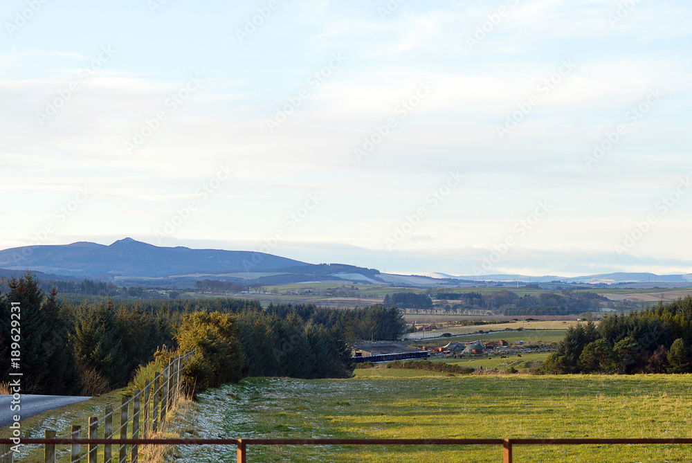 Bennachie, hills across farmland  from Fintray, Aberdeenshire, Scotland in winter