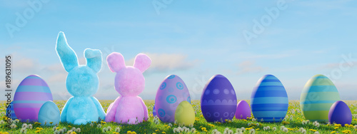 two easter rabbits sitting in lawn with easter eggs. 3d rendering photo