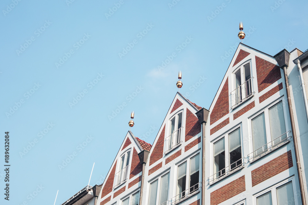 Group of houses in Dusseldorf's old town in blue sky background with copy space