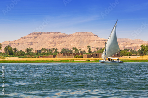 Falukas sailboat on the Nile river near Luxor, Egypt photo