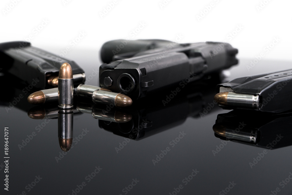 9mm Pistol gun with ammunition, Bullets and magazine on white background. Gun isolated. 9mm Pistol gun with ammunition, Bullets and magazine on white background. Gun isolated.