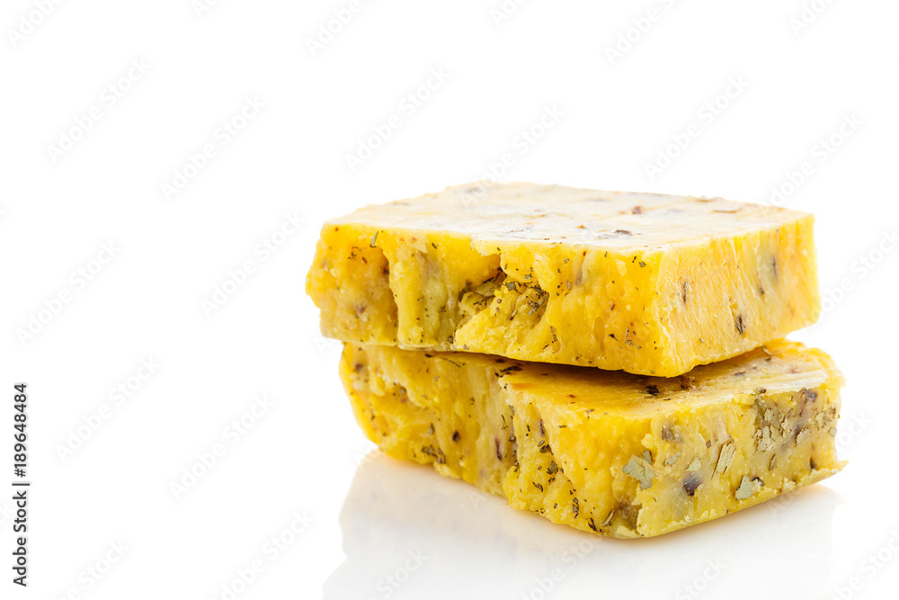 Yellow bars of natural organic soap isolated on white