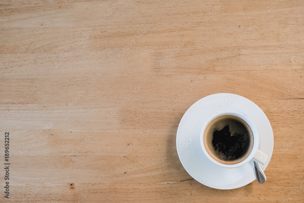 flat lay of white cup of coffee put on wooden table, with copy space flat lay of white cup of coffee put on wooden table, with copy space