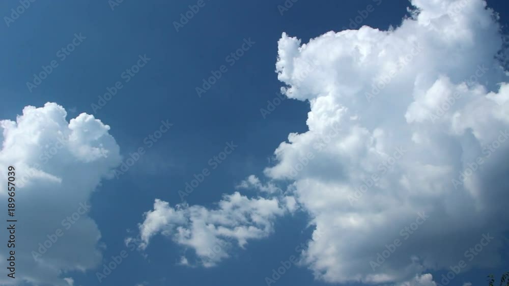 Clouds Running Across the Blue Sky, Timelapse of Vast Puffy Fluffy White Clouds, Sky Motion Background, Cloudscape with Large Building Clouds, Cloud Mass, Cumulus Clouds Form Against a Blue Sky Clouds Running Across the Blue Sky, Timelapse of Vast Puffy Fluffy White Clouds, Sky Motion Background, Cloudscape with Large Building Clouds, Cloud Mass, Cumulus Clouds Form Against a Blue Sky