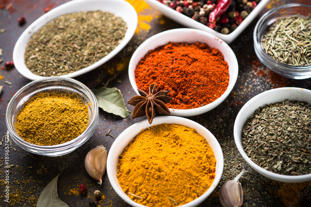 Set of Various spices on dark stone table. Set of Various spices on dark stone table.