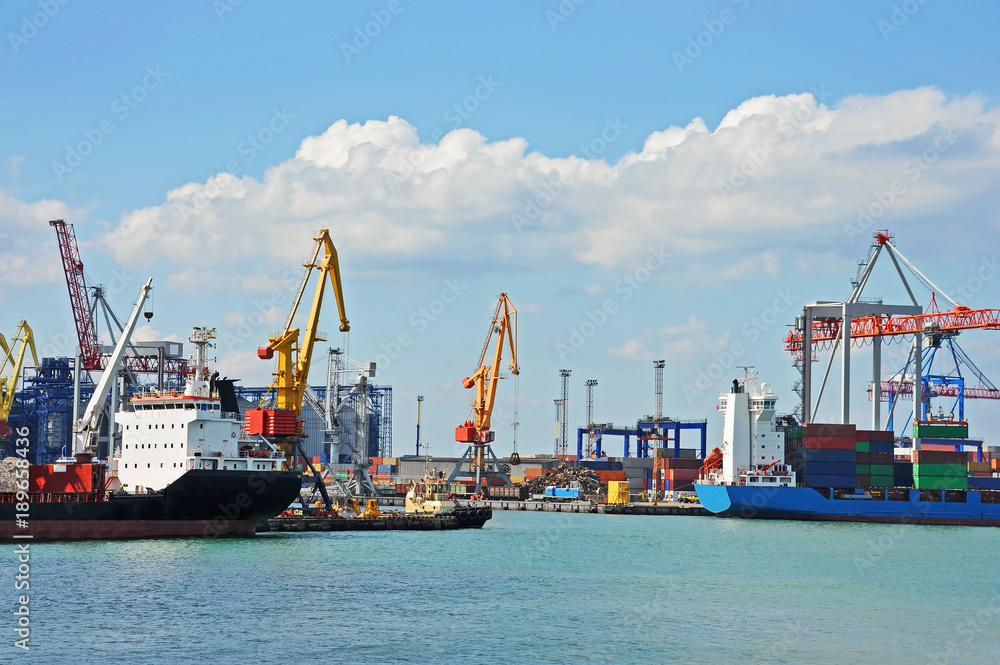 Bulk cargo ship under port crane Bulk cargo ship under port crane