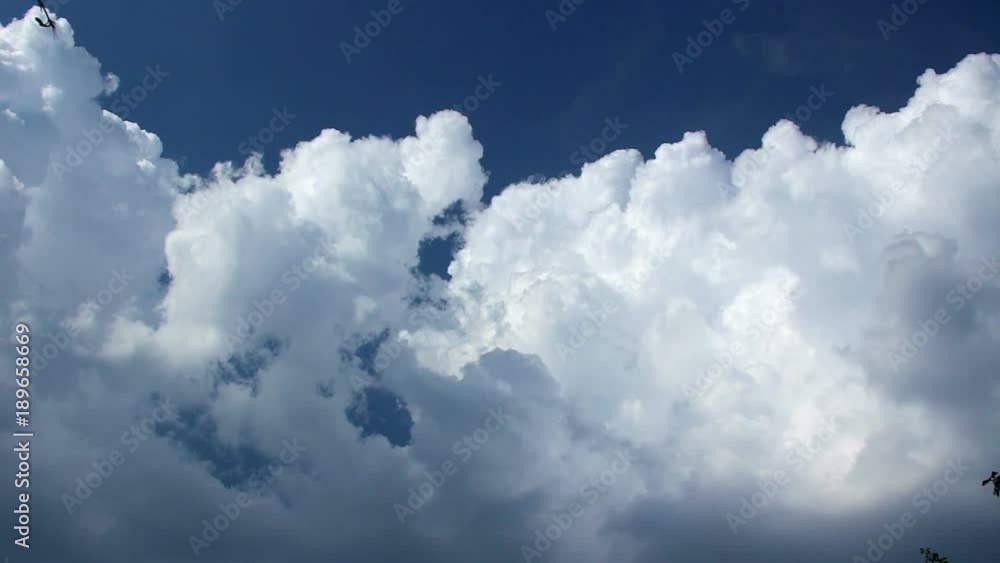 Clouds Running Across the Blue Sky, Timelapse of Vast Puffy Fluffy White Clouds, Sky Motion Background, Cloudscape with Large Building Clouds, Cloud Mass, Cumulus Clouds Form Against a Blue Sky Clouds Running Across the Blue Sky, Timelapse of Vast Puffy Fluffy White Clouds, Sky Motion Background, Cloudscape with Large Building Clouds, Cloud Mass, Cumulus Clouds Form Against a Blue Sky