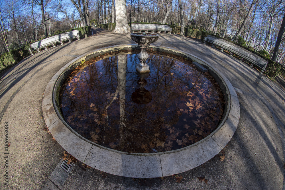 Detail of one of the fountains of the park of La Isla in Aranjuez, Madrid, Spain. Fish eye