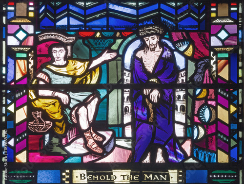 LONDON  GREAT BRITAIN - SEPTEMBER 16  2017  The scene Judgment of Jesus for Pilate on the stained glass in church St Etheldreda by Charles Blakeman  1953 - 1953 .