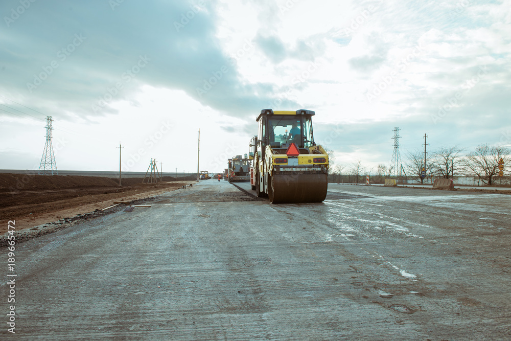 Road roller building the new asphalt road
Road roller building the new asphalt road