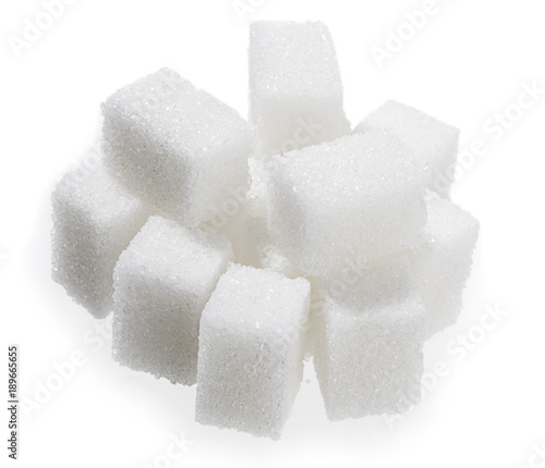Heap of sugar cubes isolated on white background.