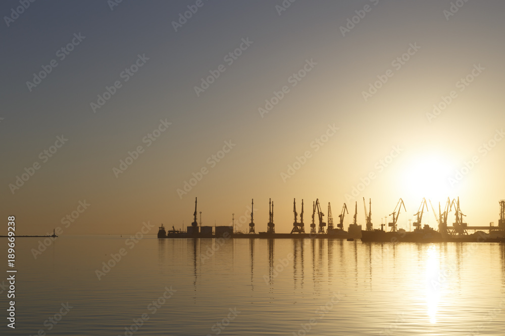 Silhouette of seaport. Sunset. Ukraine. Berdyansk