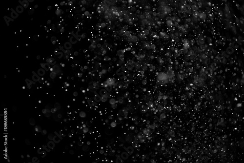 The texture of the snow on a black background