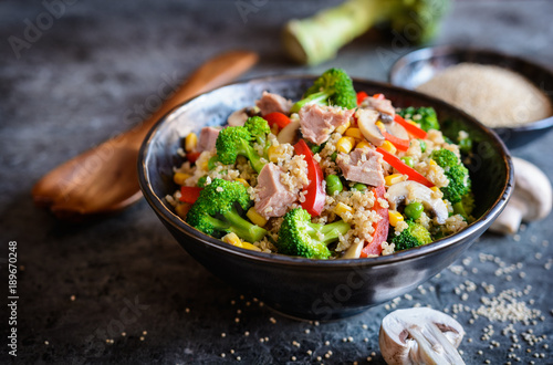 Quinoa salad with tuna, broccoli, peas, corn and mushrooms