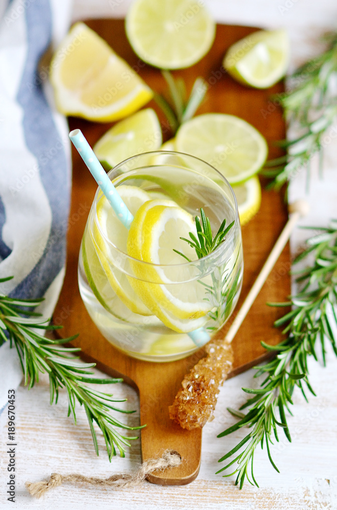 Glasses with Fresh Water Rosemary Lemon Lime Fruits White Background Beverage Healthy Lifestyle