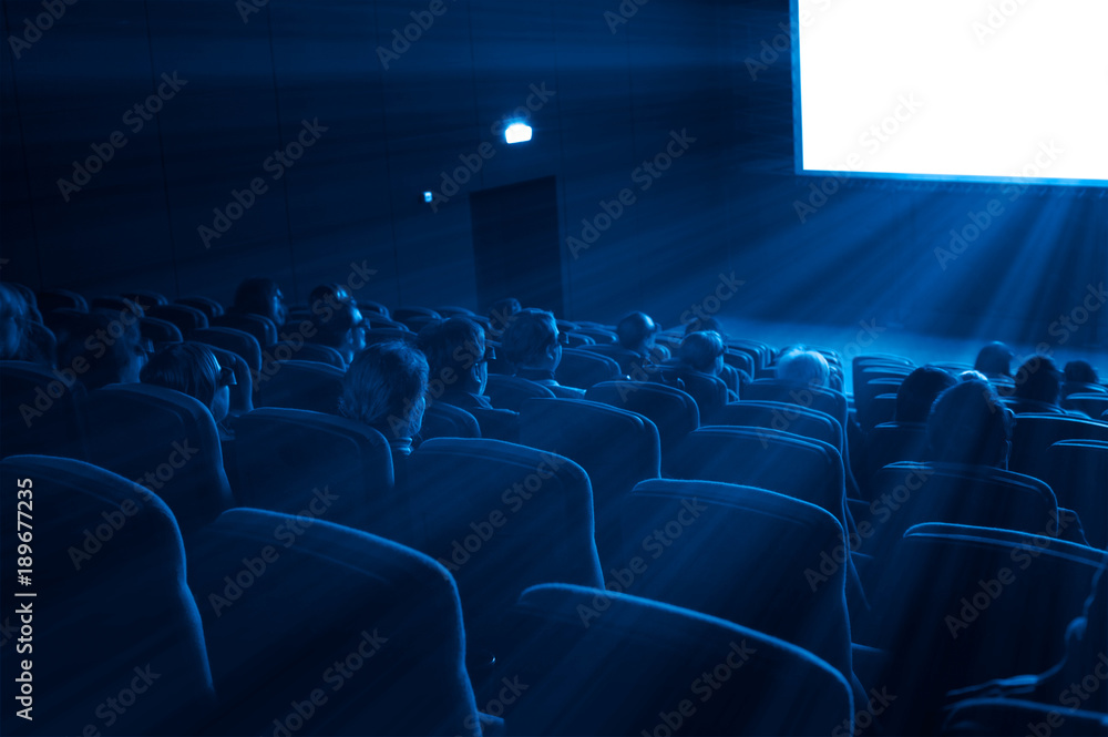 viewers watch a 3D movie, blue toning