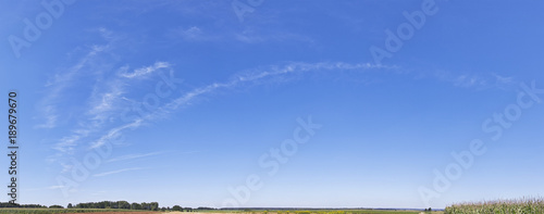 panoramic  view with big blue sky and soft clouds in the summer 