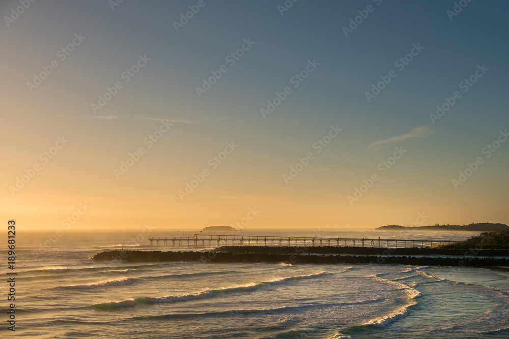 Gold Coast, Queensland/Australia - 19 January 2018:  Morning views from Point Danger over the rock wall and sand pumping jetty on the Southern Gold Coast, Australia.