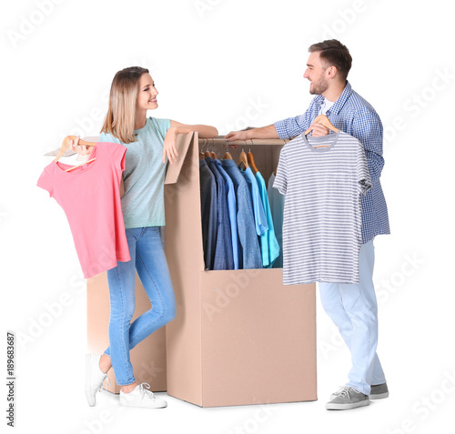 Young couple near wardrobe ...