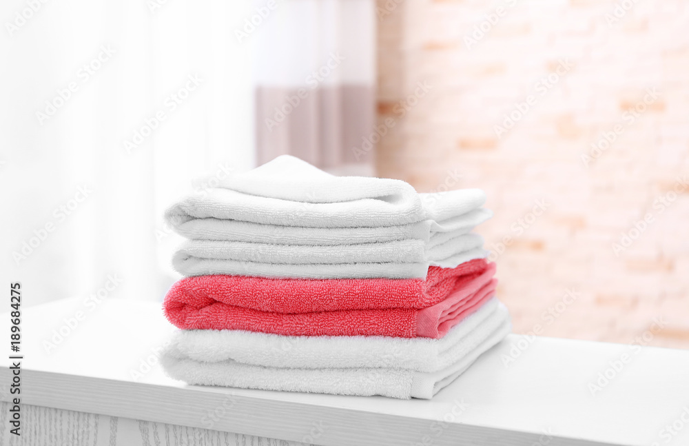 Stack of clean towels on table Stack of clean towels on table