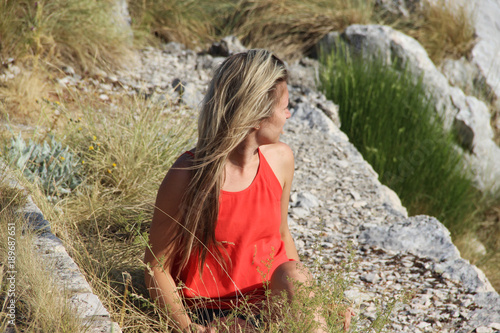 Beautiful young woman and nature
