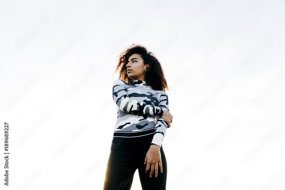 Pretty woman standing on concrete pipe Pretty woman standing on concrete pipe