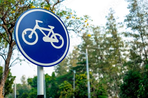 Bicycle sign in the park.