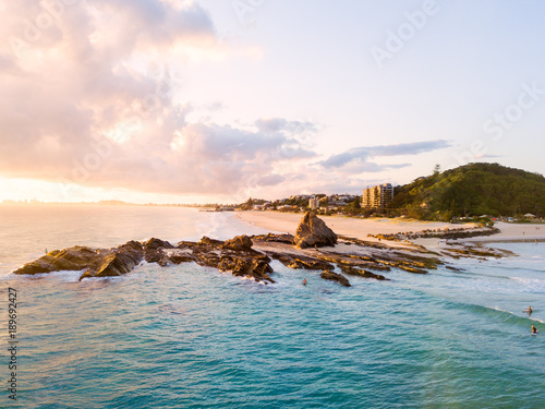 Currumbin Beach also known as Currumbin Alley at sunrise on the Gold Coast in Queensland in Australia photo